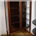 F13. Antique 4-shelf glass front cabinet. 60"h x 39"w x 15"d 